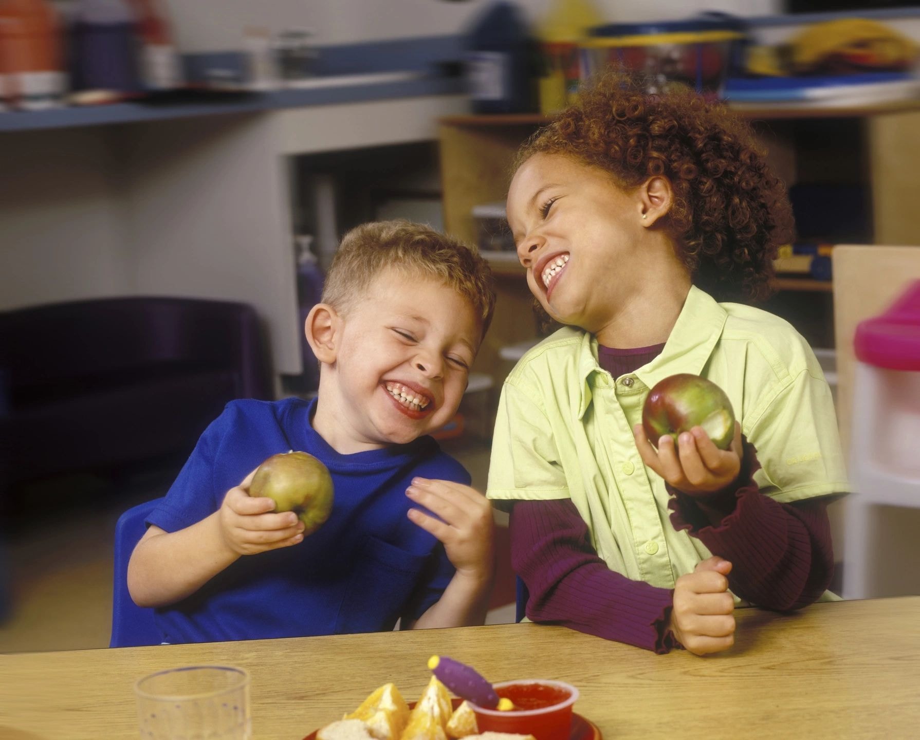 Woman and child laughing together